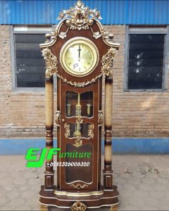 Lemari Jam Ukir Jati Jepara Motif Oyot 01